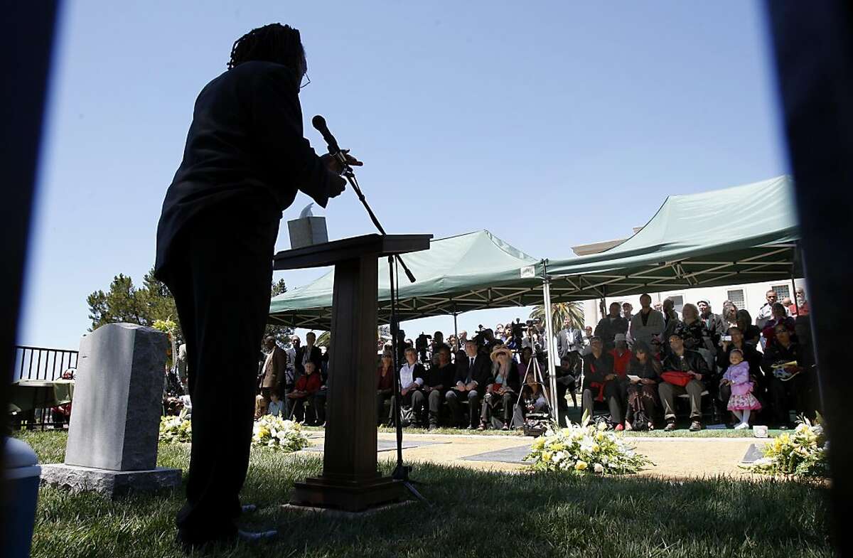 James Cobb, who lost ten members of his family in Jonestown and was in Guyana speaks in Oakland on Sunday at the unveiling of a permanent memorial to those who perished.
