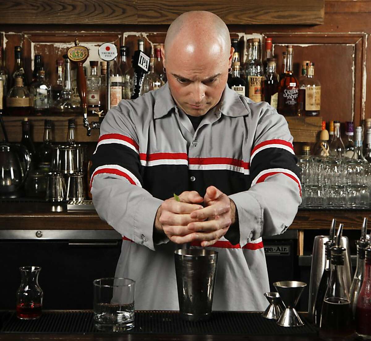 Chronicle Bar Star, Alex Smith of Gitane, mixes a Narguja at Burritt Room in San Francisco, Calif., on Tuesday, May 10, 2011.