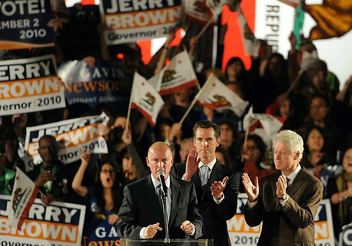 Former U.S. President Bill Clinton (C), Democratic gubernatorial candidate and California State Attorney General Jerry Brown (R) and San Francisco Mayor Gavin Newsom attend a Democratic National Committee rally on the campus of UCLA on October 15, 2010 inLos Angeles, California. Newsom is running for lieutenant governor against Republican incumbent Abel Maldonado.