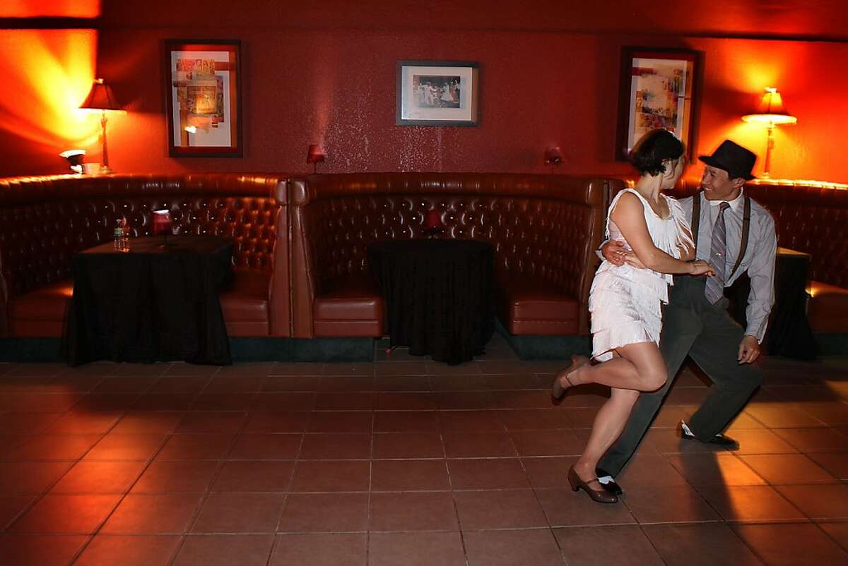 Alan Lau and his wife Linda Lau from San Francisco have the last dance at Old Skool Cafe in San Francisco, Calif., on Friday, April 22, 2011. Old Skool Cafe is a program for youth that teaches them marketable culinary skills.