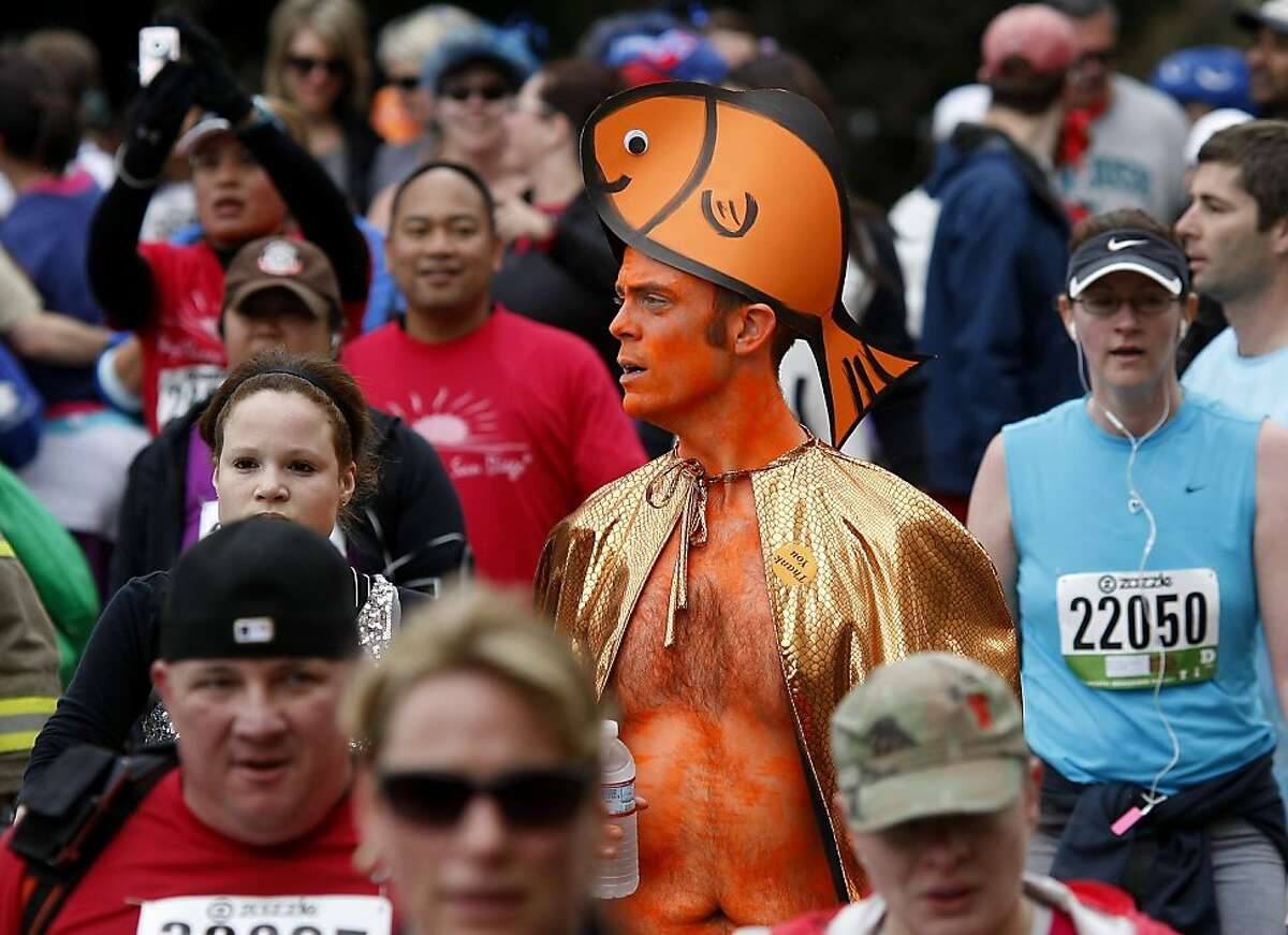 Even when you're all orange, you don't seem out of place at the Bay to Breakers. The 100th running of the Bay to Breakers race in San Francisco, Calif. featured thousands of people and a few new rules to tame past turmoil Sunday May 16, 2011.