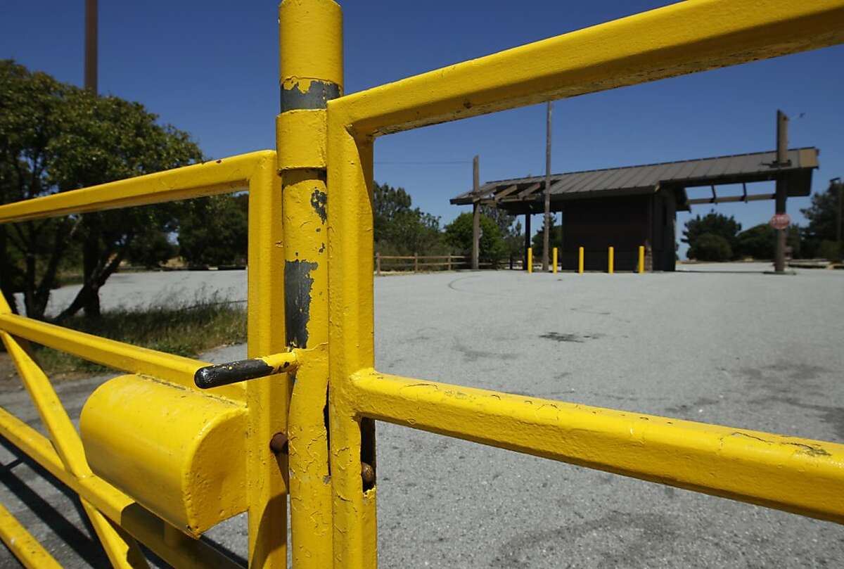 The entrance to the Candlestick Point State Recreation Area is locked in San Francisco, Calif. on Friday, May 13, 2011. The parkland, situated across from Candlestick Park, is among the 70 state parks that will close in September as a result of budget cuts.