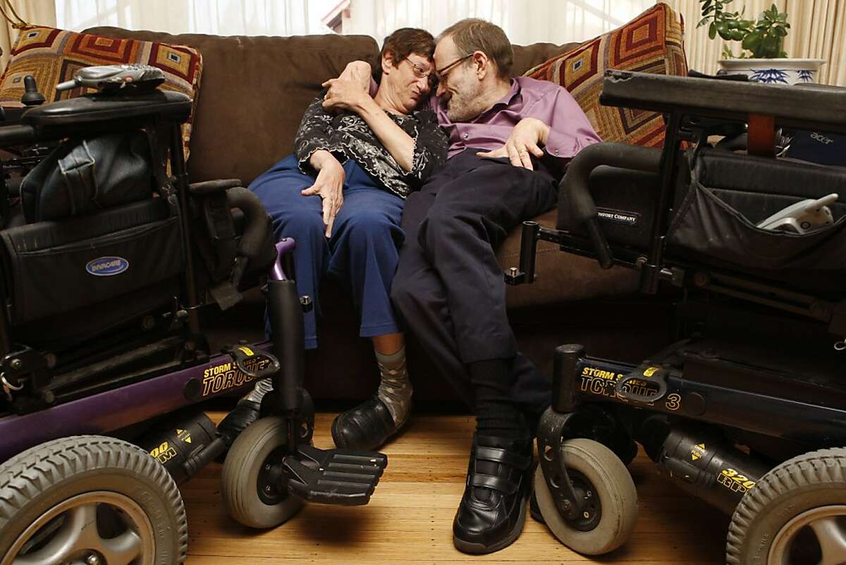 Denise Sherer Jacobson and Neil Jacobson sit on the couch of their Oakland Calif, home on Tuesday, May 10, 2011. The Jacobsons have been married for nearly 28 years or 'forever' according to them.