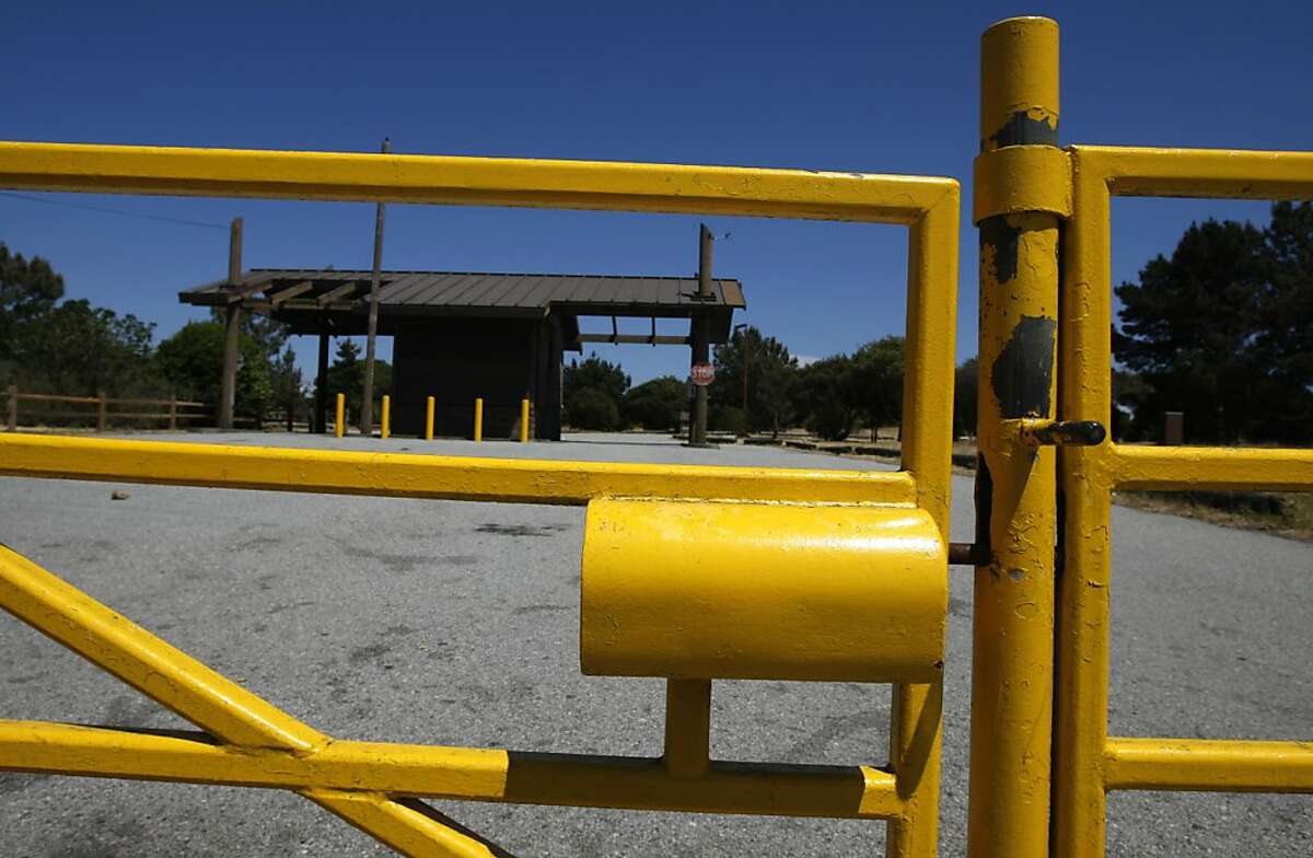 The entrance to the Candlestick Point State Recreation Area is locked in San Francisco, Calif. on Friday, May 13, 2011. The parkland, situated across from Candlestick Park, is among the 70 state parks that will close in September as a result of budget cuts.