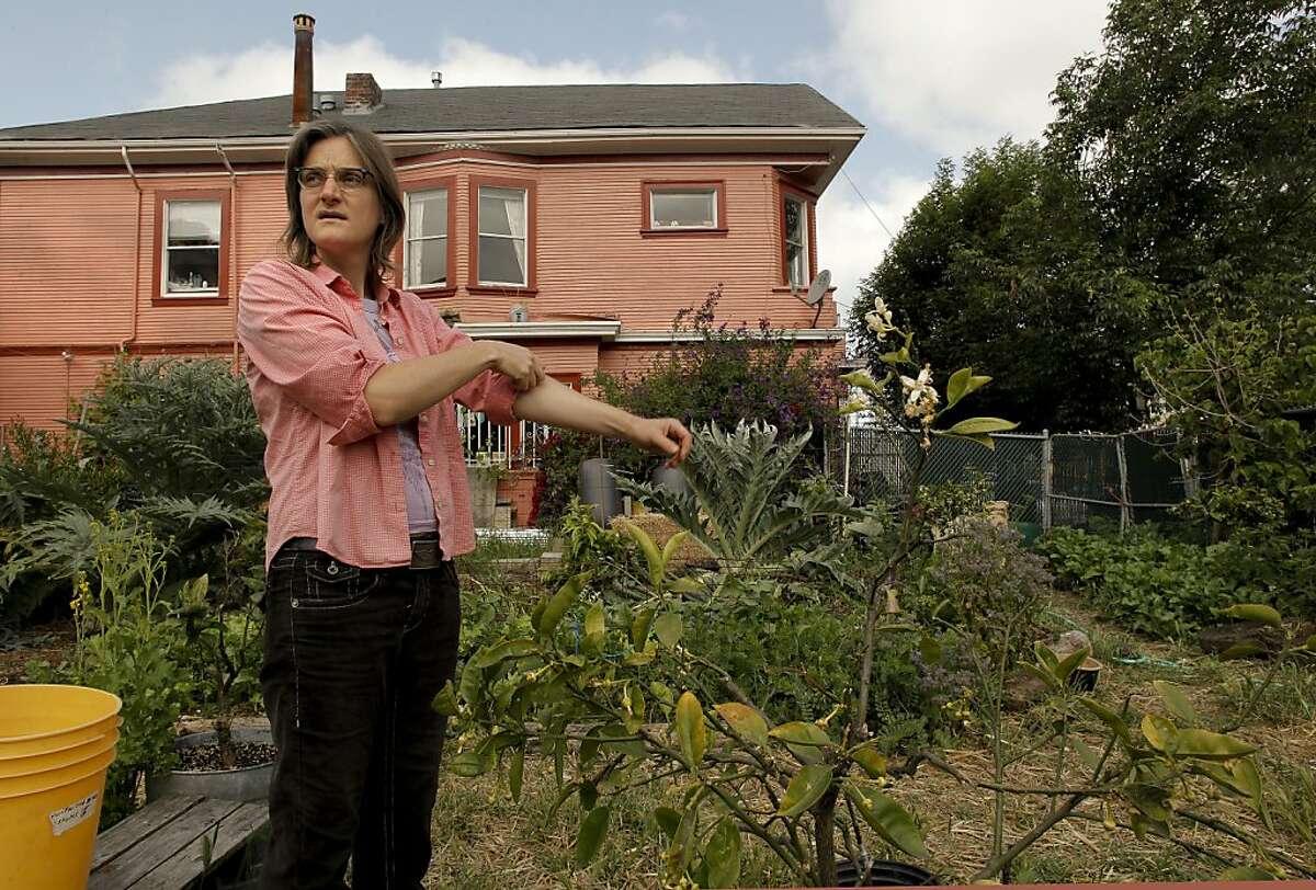 Novella Carpenter, is in the process of shuting down her GhostTown Farm on the corner of Martin Luther King Blvd. and 28th Street in Oakland, Ca., on Saturday May 7, 2011. For eight years Carpenter and her boyfriend have farmed on a vacant urban lot growing vegetables and raising ducks, goats and rabbits. The City of Oakland came by her farm and shut her down, saying she needed a $5,000 permit to grow vegetables there.