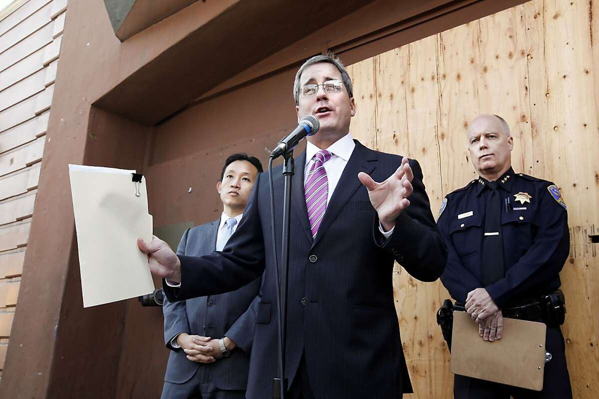 San Francisco City Attorney Dennis Herrera, (center) is joined by Board of Supervisors President David Chiu, (left) and Assistant Police Chief Kevin Cashman, in front of the much maligned nightclub, "Suede" in San Francisco, Calif. on Thursday Apr. 15, 2010, as Herrera announces that he has filed a lawsuit to shut down the club after a shootout last February left one person dead and four others wounded. The club is currently closed after their license was revoked for thirty days on April 5th.