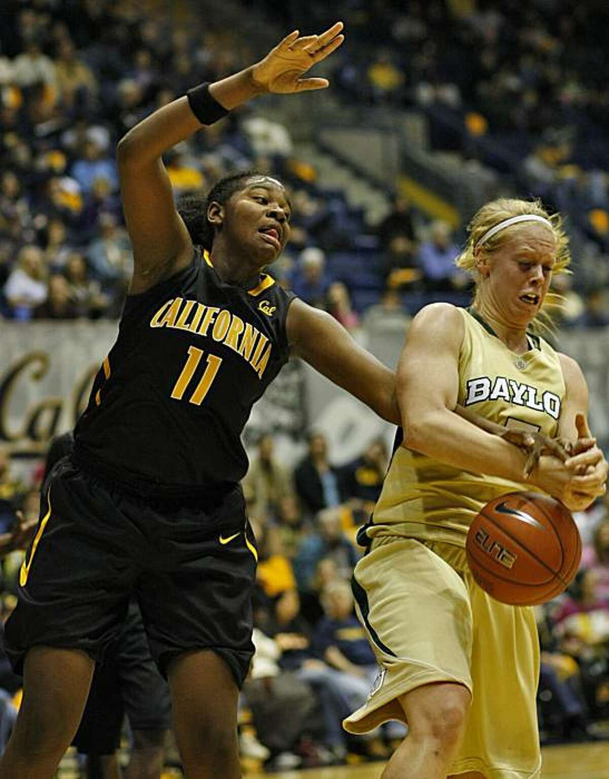 Cal's DeNesha Stallworth struggles with Baylor's Melissa Jones on Sunday in Berkeley.