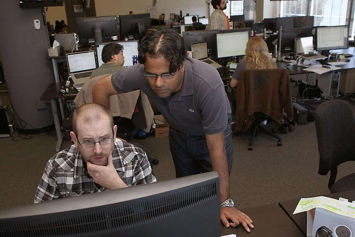 Ayan Mandal (middle) talking with an engineer at Lookout Mobile Security, which relocated to a bigger space last November and is recently searching for an even bigger space in San Francisco, Calif., on Monday, May 2, 2011. Lookout Mobile Security is a mobile security and antivirus software for smartphone protection,