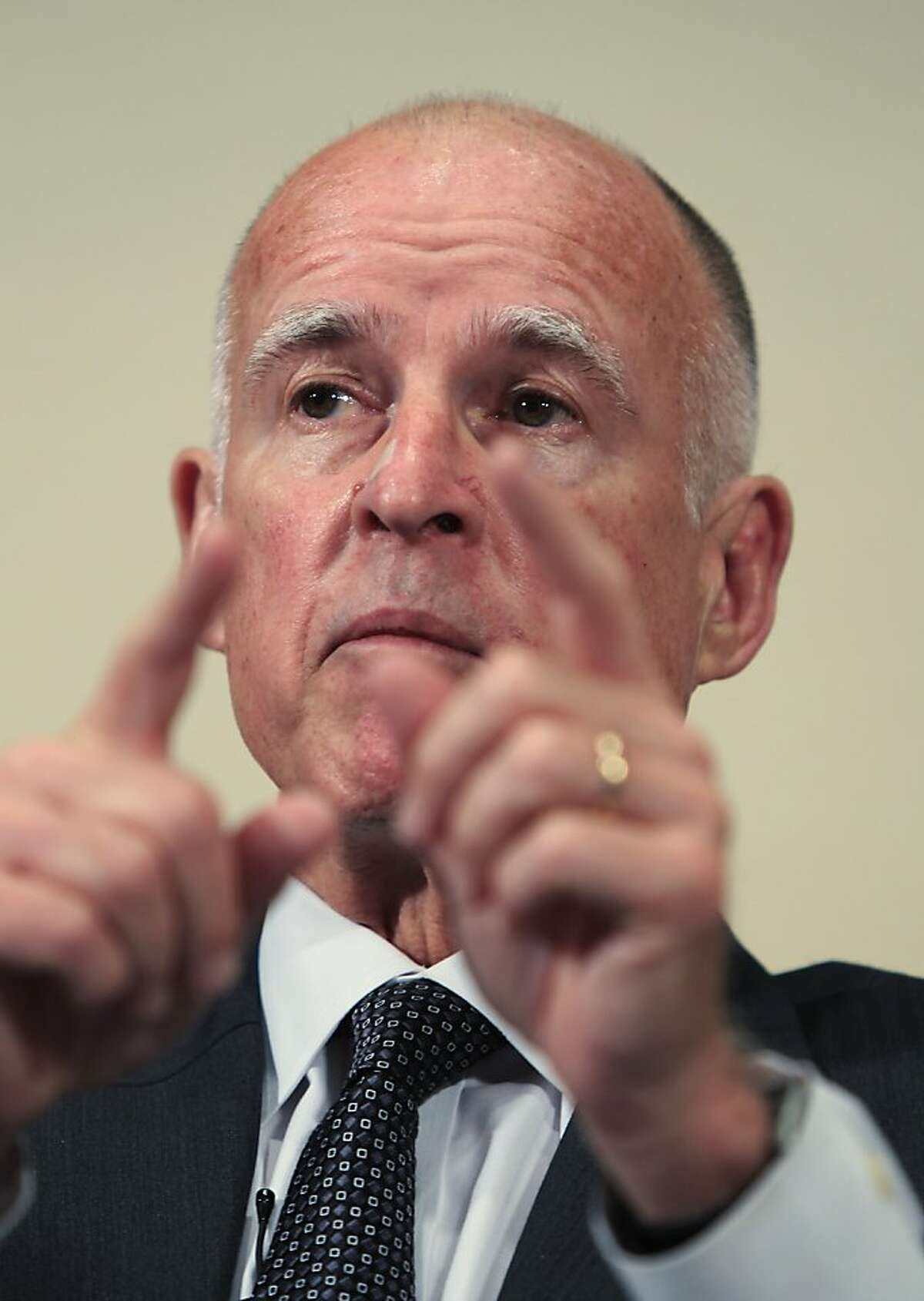 Calif. Gov. Jerry Brown gestures during the 8th Annual CEO Summit at IBM offices in San Jose, Calif., Friday, April 22, 2011.