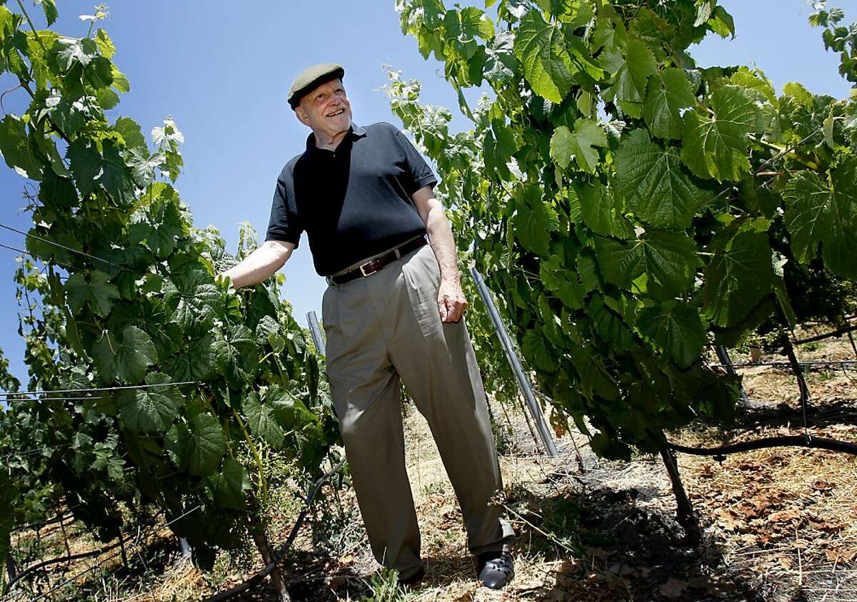 Jackson smiles as he tours some of his grape vines on the ranch. He still does tastings almost every day. Jess Jackson, winemaker turned racehorse owner, at his ranch near Geyserville still calls himself a farmer as he roams around on his huge estate on Alexander mountain.