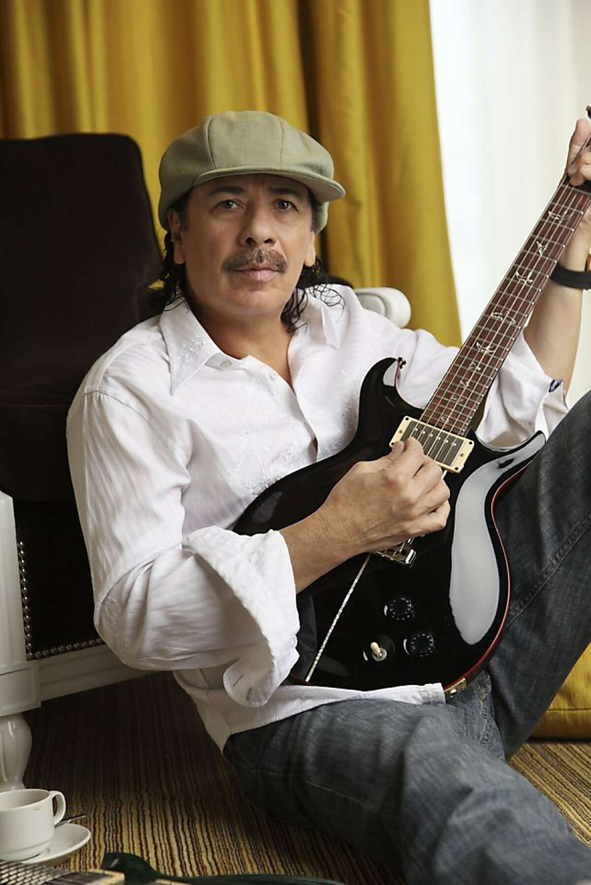 Carlos Santana will perform with the Oakland East Bay Symphony in the orchestra's season opener