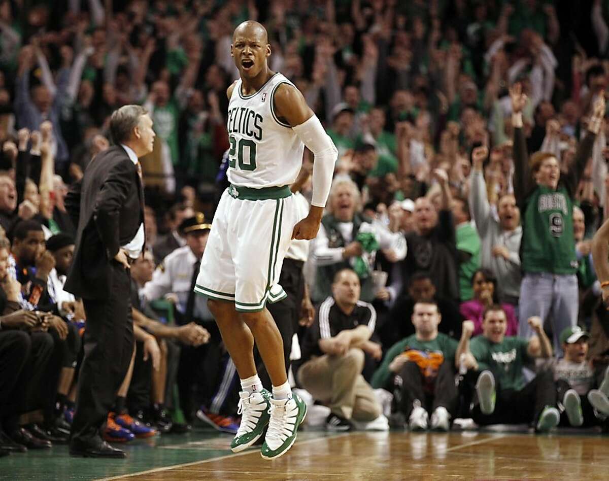 Boston Celtics' Ray Allen celebrates after hitting the game winning 3-point shot as New York Knicks coach Mike D'Antoni, left, stands in front of the bench during the fourth quarter of Boston's 87-85 win in Game 1 of a first-round NBA playoff basketball series in Boston on Sunday, April 17, 2011.