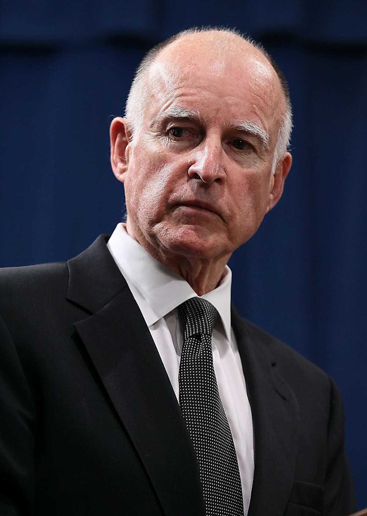 SACRAMENTO, CA - MARCH 24: California Gov. Jerry Brown speaks to reporters following a bill signing on March 24, 2011 in Sacramento, California. California Gov. Jerry Brown signed 13 bills into law that will cut $11.2 billion from California's budget deficit. $12.6 billion still needs to be cut to balance the budget.