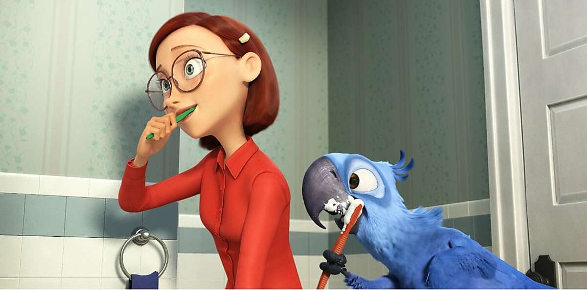 In this publicity image released by 20th Century Fox, the animated characters Linda, voiced by Leslie Mann, left, and Blu, voiced by Jesse Eisenberg, are shown in a scene from "Rio."
