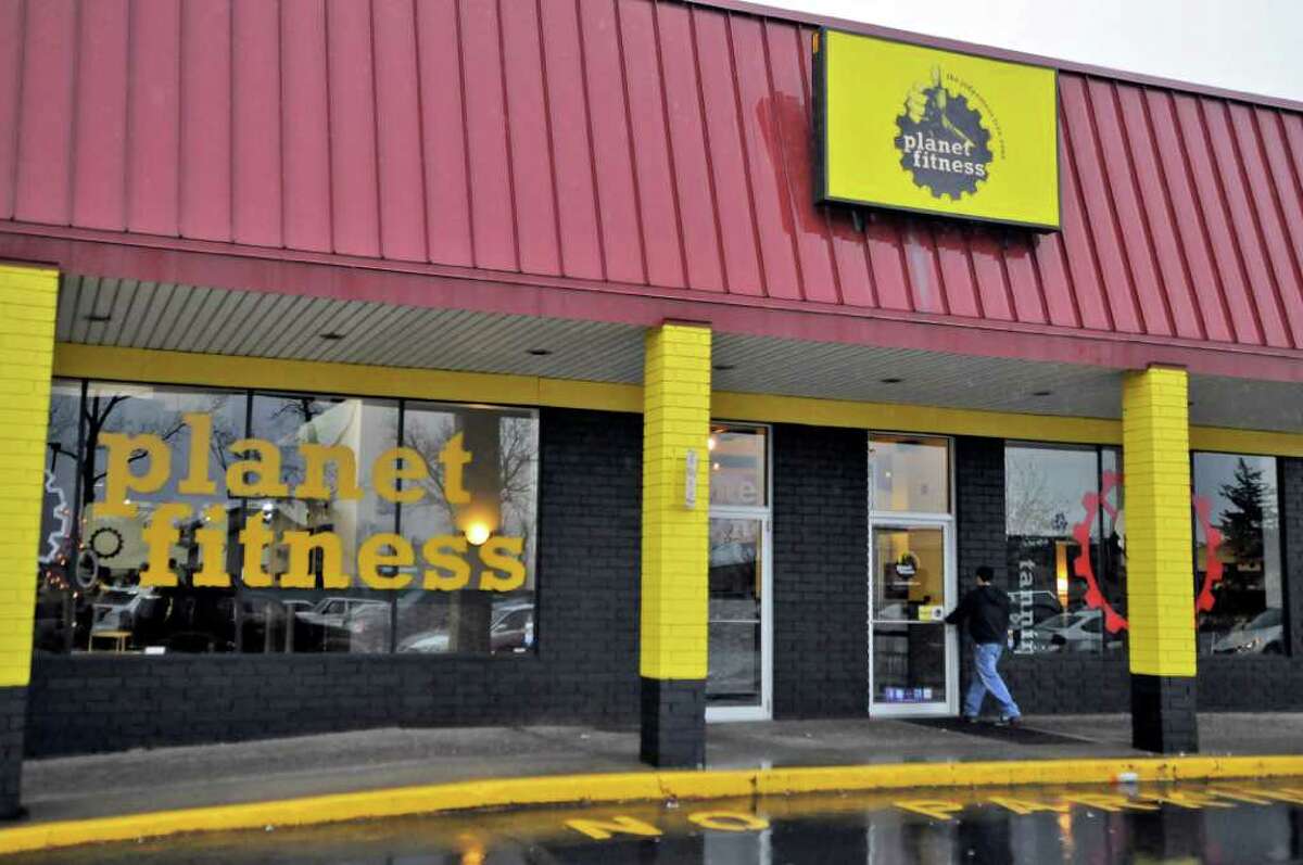 This Planet Fitness gym has been charging Amy George for 5 years for a membership she never signed up for. The building is seen on Wednesday Dec. 7, 2011 in Loudonville, NY. (Philip Kamrass / Times Union )