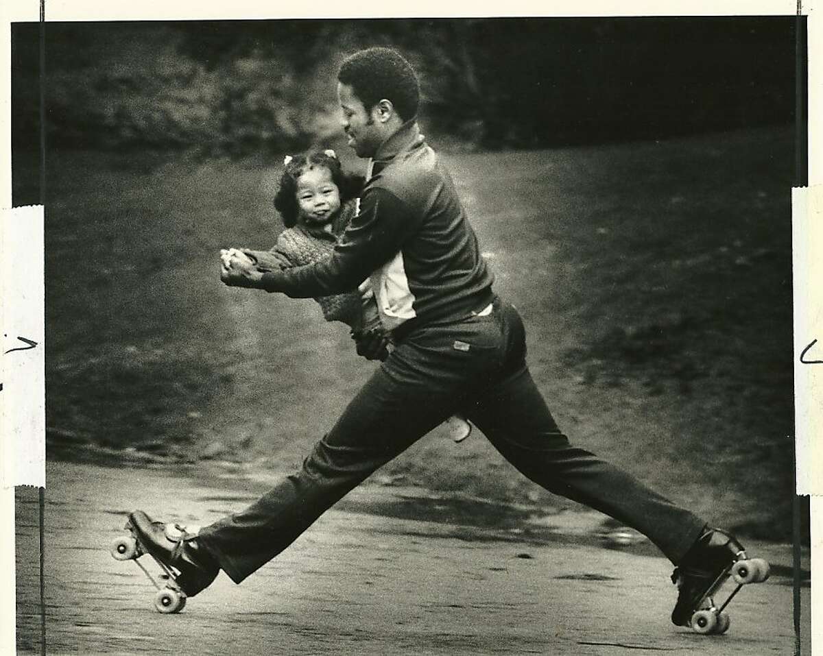 In this 1986 photo, Dave Miles Jr. skates with his then-2-year-old daughter Melanie. Miles heads the California Outdoor Rollerskating Association and Melanie is a skate dancing champion.