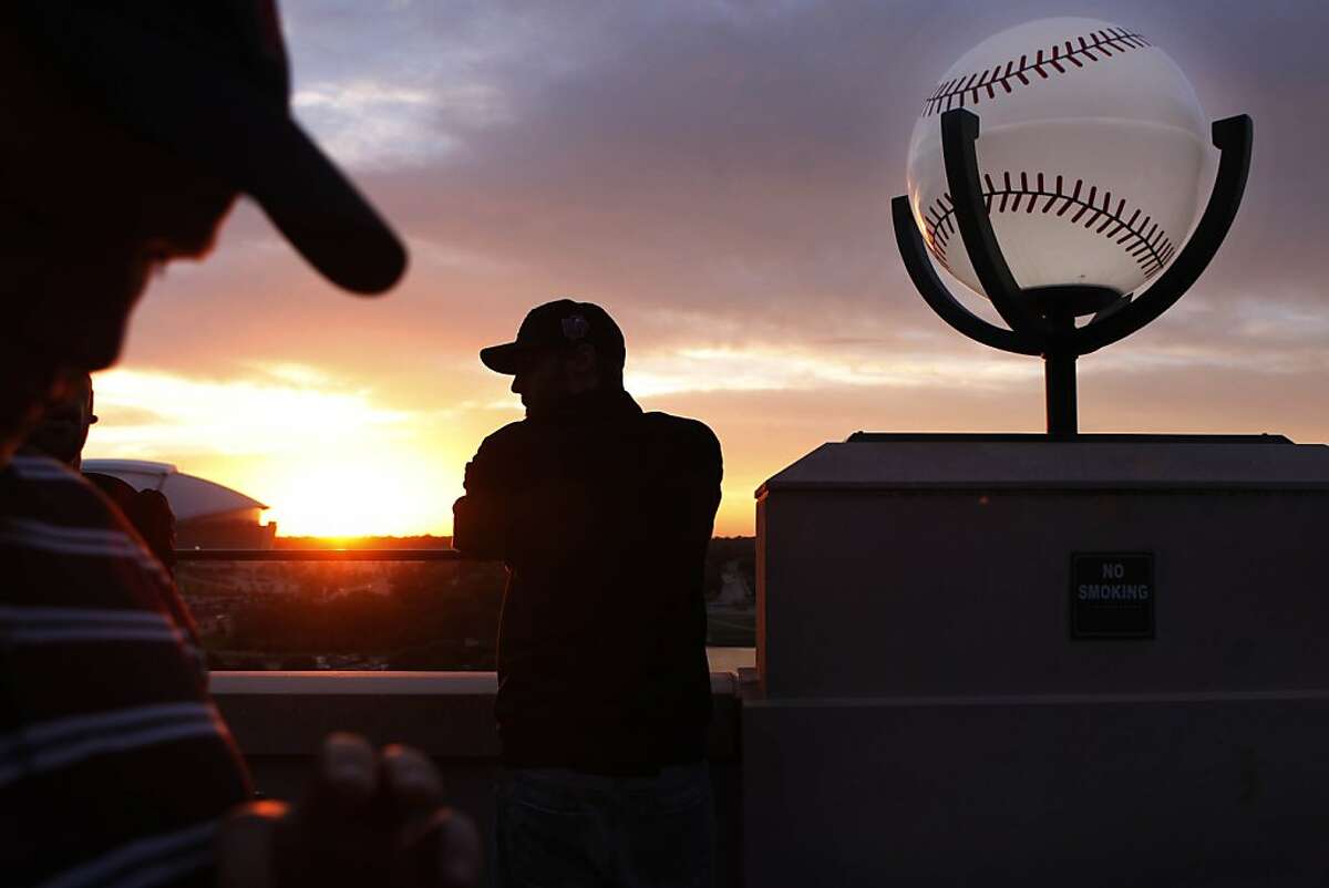Nick Tanza of San Francisco, who works in the Giants' enterprises department, takes in the view from the top of Rangers Ballpark before Game 5 of the World Series on Monday.