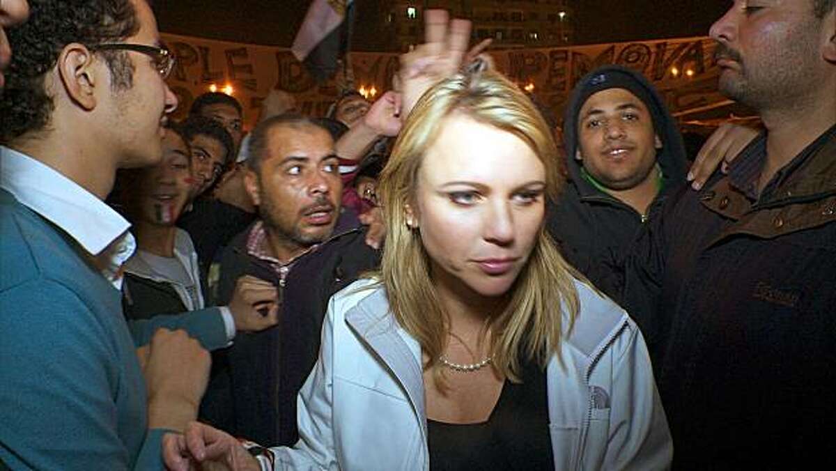In this Feb. 11, 2011 photo released by CBS, "60 Minutes" correspondent Lara Logan is shown covering the reaction in in Cairo's Tahrir Square the day Egyptian President Hosni Mubarak stepped down. CBS News says Logan was attacked Friday, and suffered a brutal beating and sexual assault before being saved by a group of women and an estimated 20 Egyptian soldiers. She is recovering in a U.S. hospital. Logan, CBS News' chief foreign affairs correspondent, is one of at least 140 correspondents who have beeninjured or killed since Jan. 30 while covering the unrest in Egypt, according to the Committee to Protect Journalists.