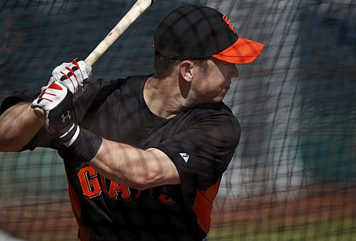 Buster Posey waited for a pitch during batting practice. The 2010 World Champion San Francisco Giants held their first workout of the spring at Scottsdale Stadium Tuesday February 15, 2011.