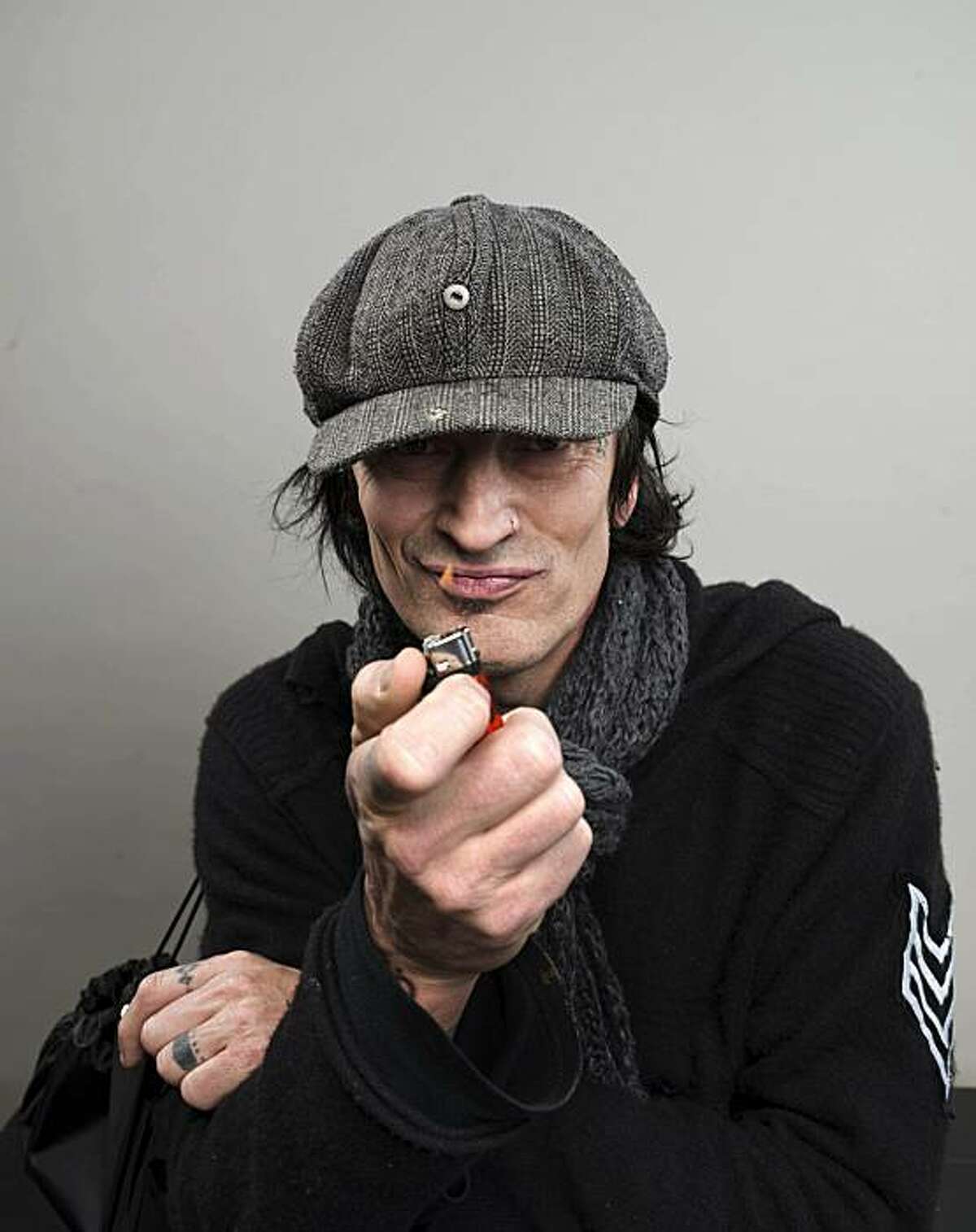 Motley Crue rocker Tommy Lee turns 50 today, Wednesday, October 3, 2012. Here he poses for a portrait last year.