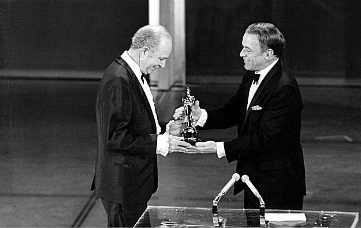 Frank Sinatra presents an Oscar to Jack Albertson at the Academy Awards ceremony at the Music Center in Los Angeles, Ca., April 14, 1969. Albertson was named best supporting actor for his role in the movie "The Subject Was Roses." (AP Photo)
