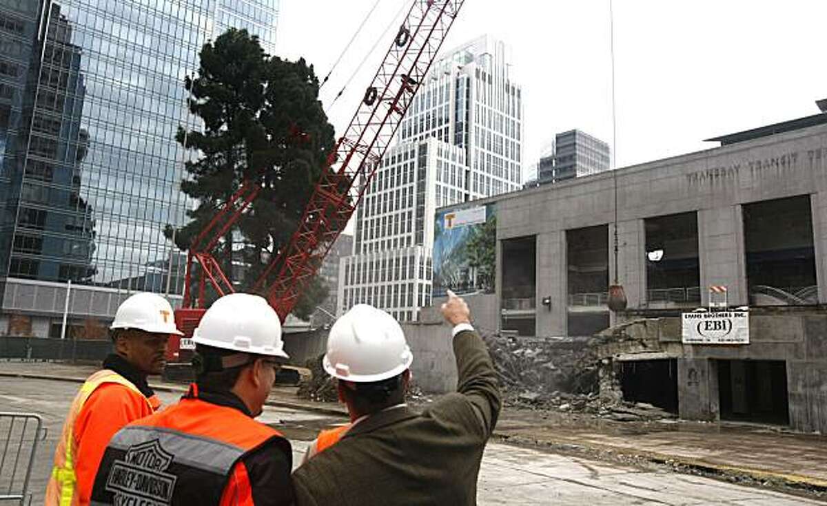 Construction personnel along with spectators looked on as the Big Red, crane, dropped its wrecking ball on the old Transbay Terminal building in San Francisco Friday Dec 3, 2010