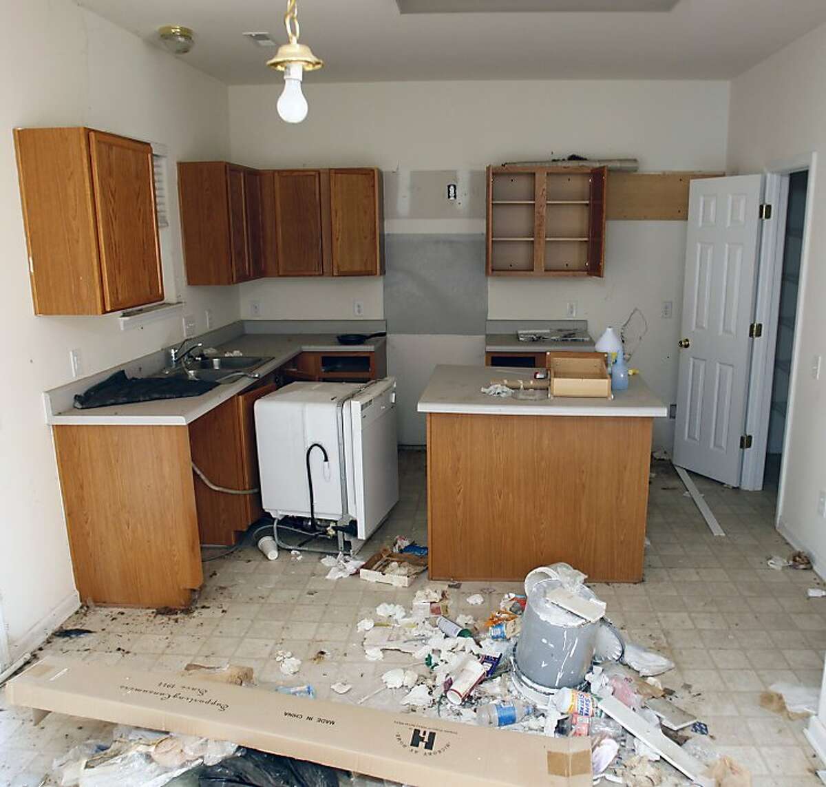 ** ADVANCE FOR USE SUNDAY, MARCH 27, 2011 AND THEREAFTER ** This Wednesday, Feb. 16, 2011 picture shows the interior of one of the homes in the Peachtree Hills subdivision of Charlotte, N.C. bought by the Self-Help organization for resale, many of which are vandalized. Many people sought the American Dream in starter homes here. But in this and a neighboring subdivision is a bitter lesson in how the mortgage disaster of the last few years came about, and the story of the gambles and errors that pushed theeconomy, and neighborhoods like this, over a cliff.