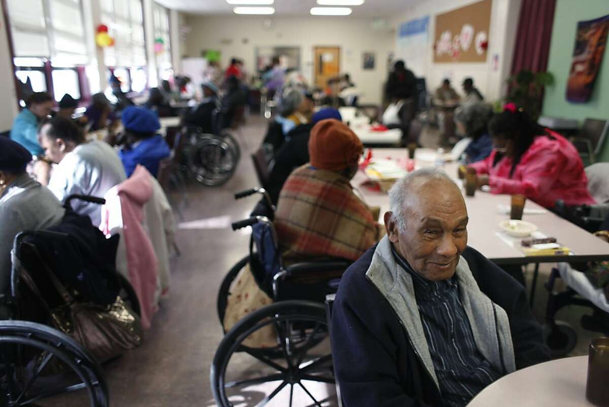 Waiting for lunch, Al Williams, 76, sits at the head of filled tables at the Bayview Hunter's Point Adult Day Health Center on Thursday Feb. 3, 2010 in San Francisco, Calif. "I have no where else to go," said Williams. In an effort to help save the state's budget crisis, California Gov. Jerry Brown has proposed eliminating funding for the adult day health care programs which could be potentially devastating for the 37,000 people who depend on theses programs daily.