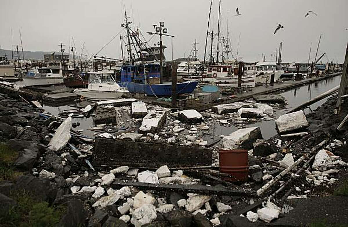 Debris clogs the Crescent City Harbor on Saturday.