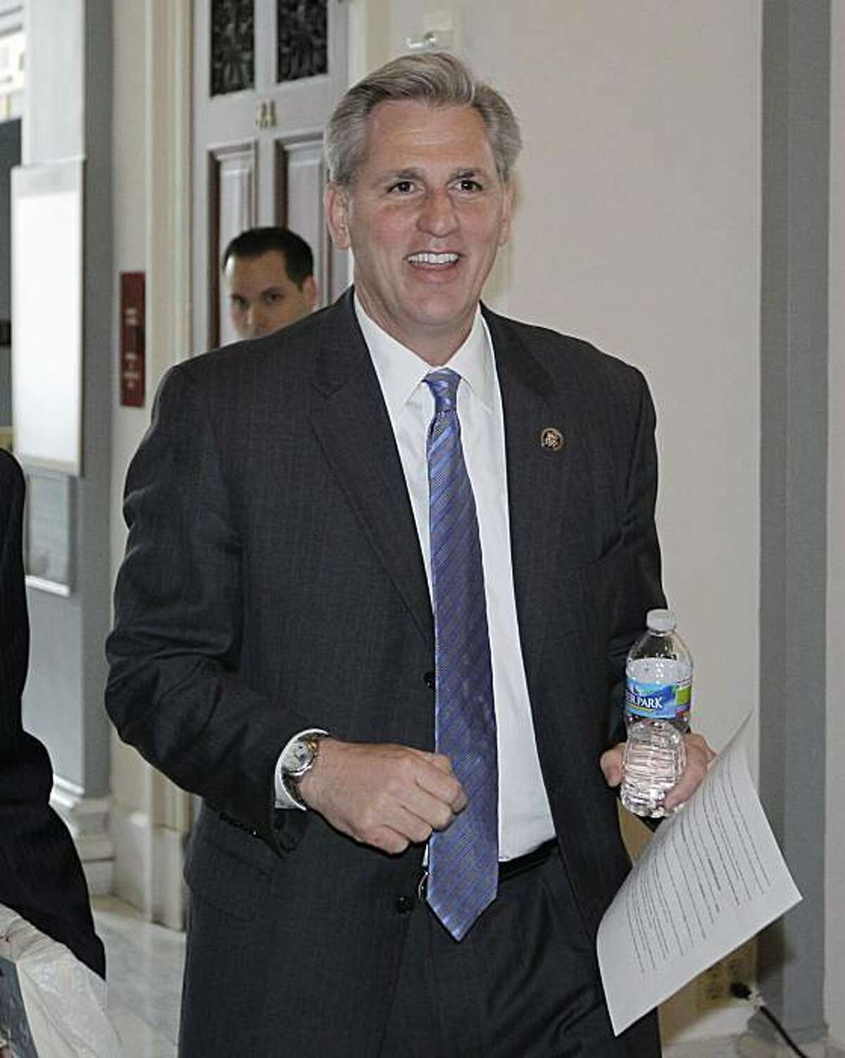 Incoming House Majority Whip Kevin McCarthy of Calif. arrives for a closed GOP conference on Capitol Hill in Washington, Tuesday, Jan. 4, 2011.
