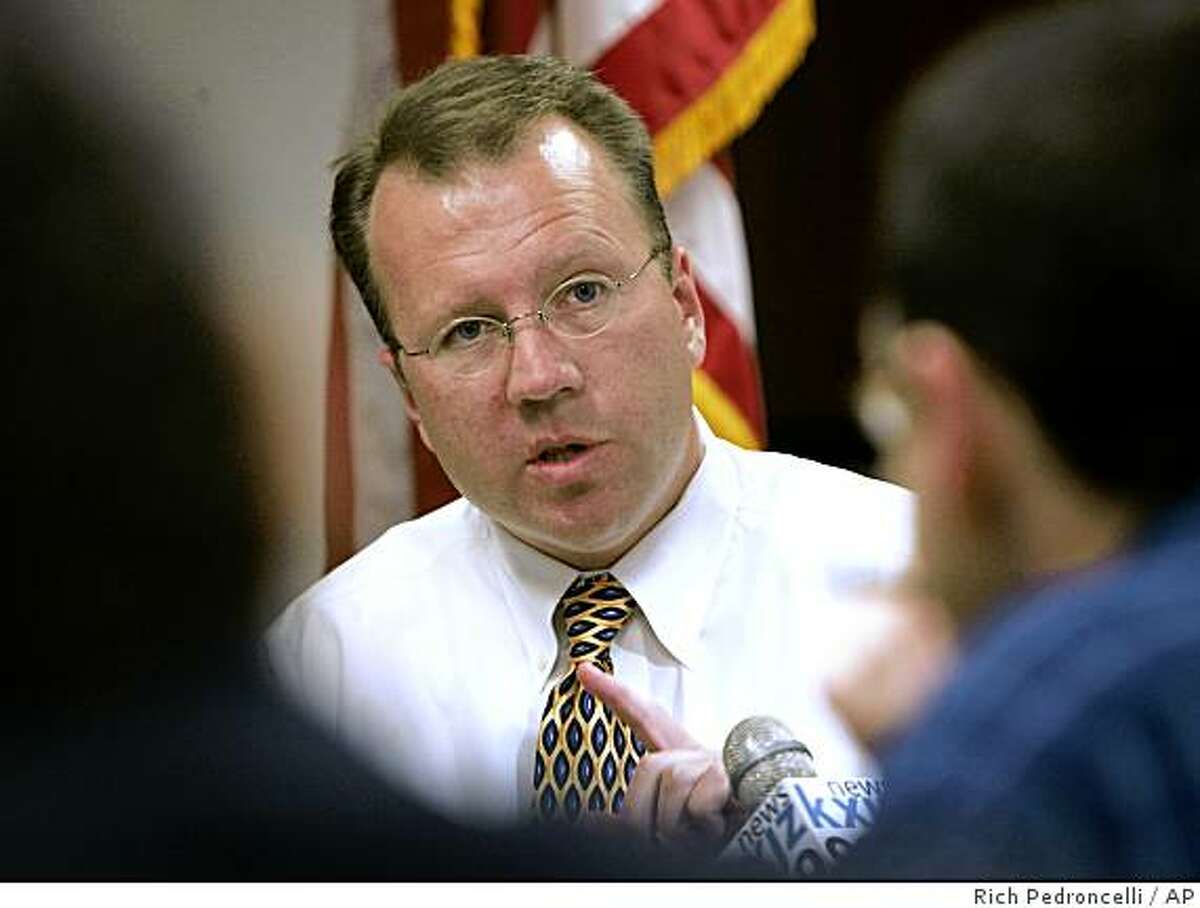 Ron Nehring, center, who was elected as chairman of the California Republican Party in last weekend's state convention, answers reporters question during a news conference, Wednesday, Feb. 14, 2007, held in Sacramento, Calif. (AP Photo/Rich Pedroncelli) Ran on: 06-27-2007