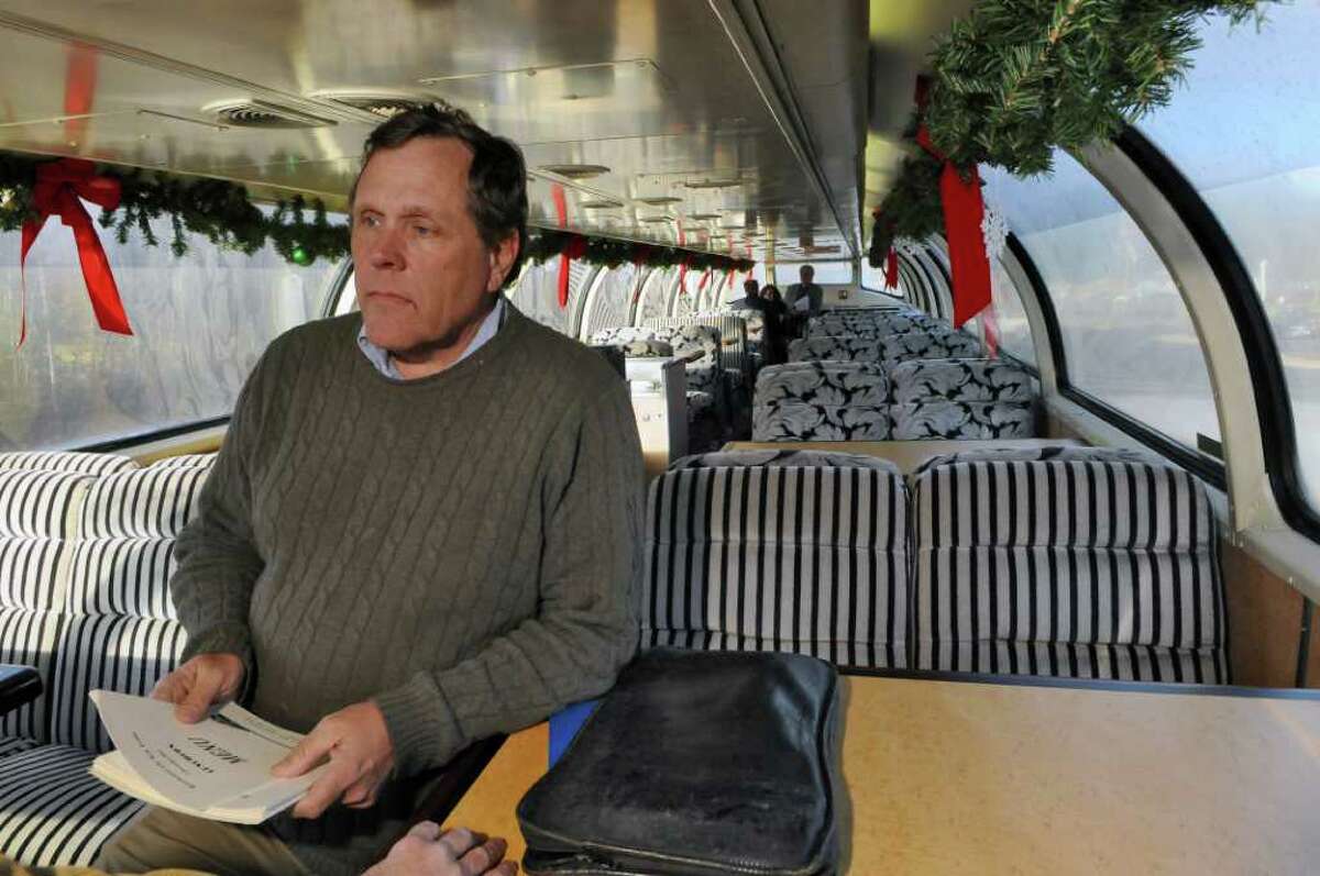 Iowa Pacific Holdings president Ed Ellis on board the Polar Express in 2011. A plan to store old rail cars has drawn the ire of environmentalists. (File photo)