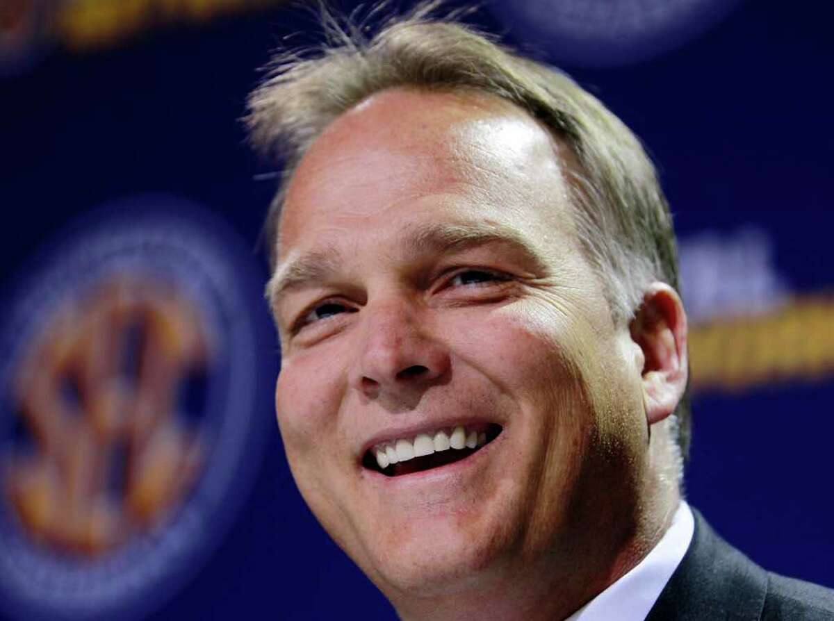 Georgia coach Mark Richt smiles during an NCAA college football news conference Friday, Dec. 2, 2011 in Atlanta. LSU will face Georgia in the Southeastern Conference Championship football game on Saturday.