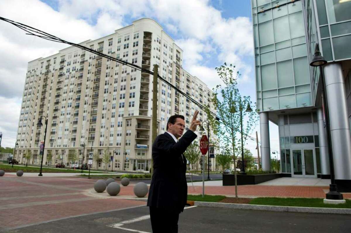 Gov. Dan Malloy tours Harbor Point development in the South End of Stamford, Conn. on May 11, 2011. The redevelopment of the industrial section of the city began when Malloy was mayor.