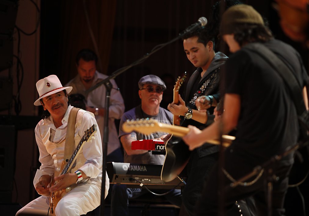 Carlos Santana (third from right) greets special education dance