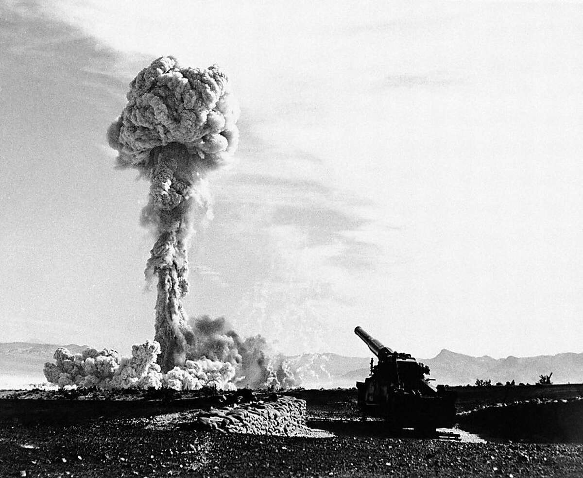 The towering lacy mushroom from the atomic cannonâ€™s first test rises from desert floor at Frenchmanâ€™s flat, near Las Vegas, Nevada on May 25, 1953. The 280-mm gun which tossed the shell to its destination six or seven mile away is in the foreground. The rifle was touched off electrically, with the gun-loading crew entrenched a safe distance away. This picture, released on May 27, by the air force, was made probably about 10 seconds after the explosion. (AP Photo) Ran on: 12-11-2011 Frenchmans flat near Las Vegas erupts in an atomic explosion from a canon-launched bomb on May 25, 1953, part of the United States Cold War nuclear weapons tests. Is it time to rethink the role that nuclear arms will play in Americas future? Story, Page E6