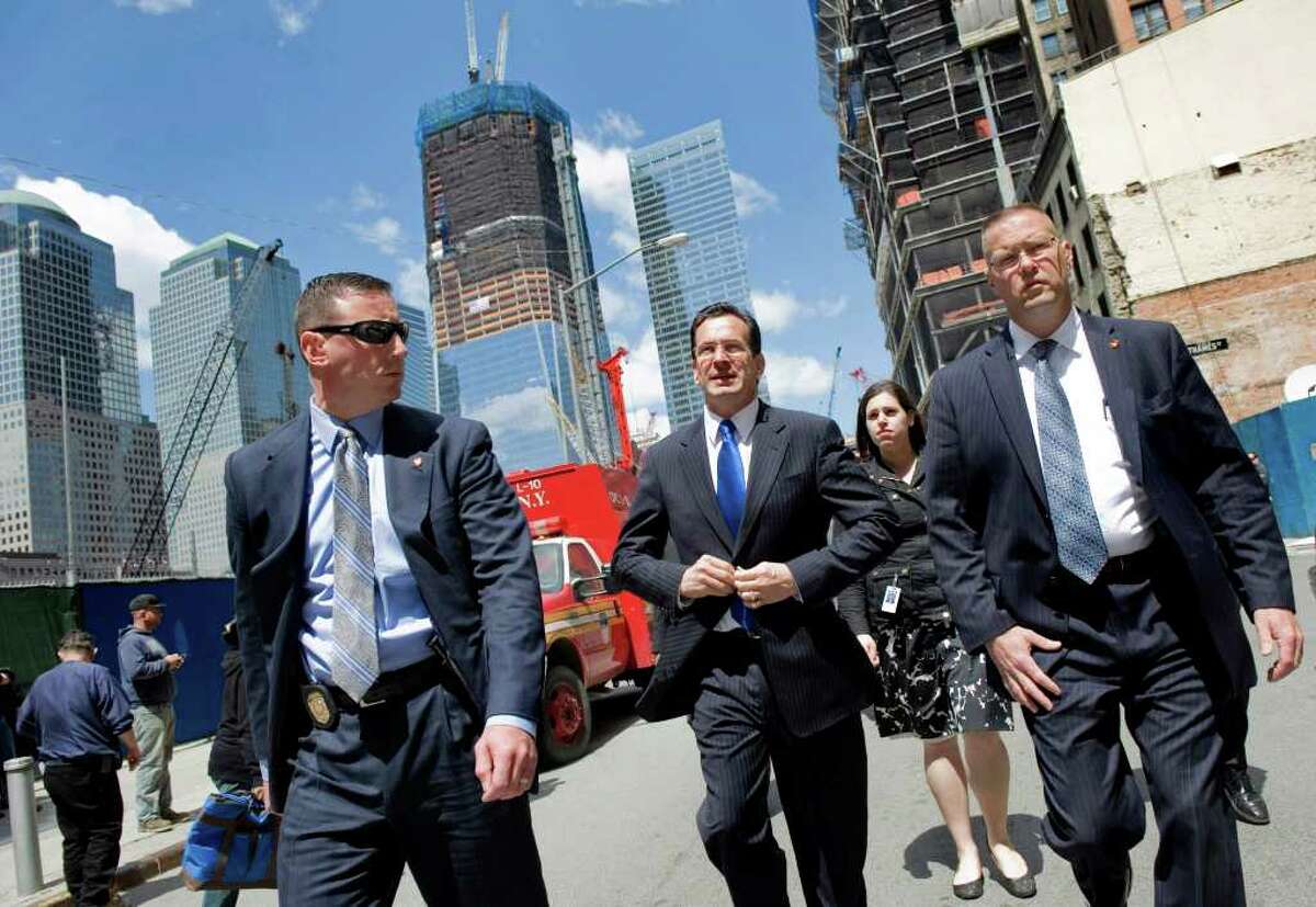 Gov. Dan Malloy leaves Ground Zero in New York City on May 5, 2011, after attending a tribute to the victims of the Sept. 11, 2001 terrorist attacks led by President Obama after Osama bin Laden was killed. Malloy's security detail, Trooper Steven Zonghetti and Trooper Dan Rybacki lead the way as Arielle Reich trails behind.