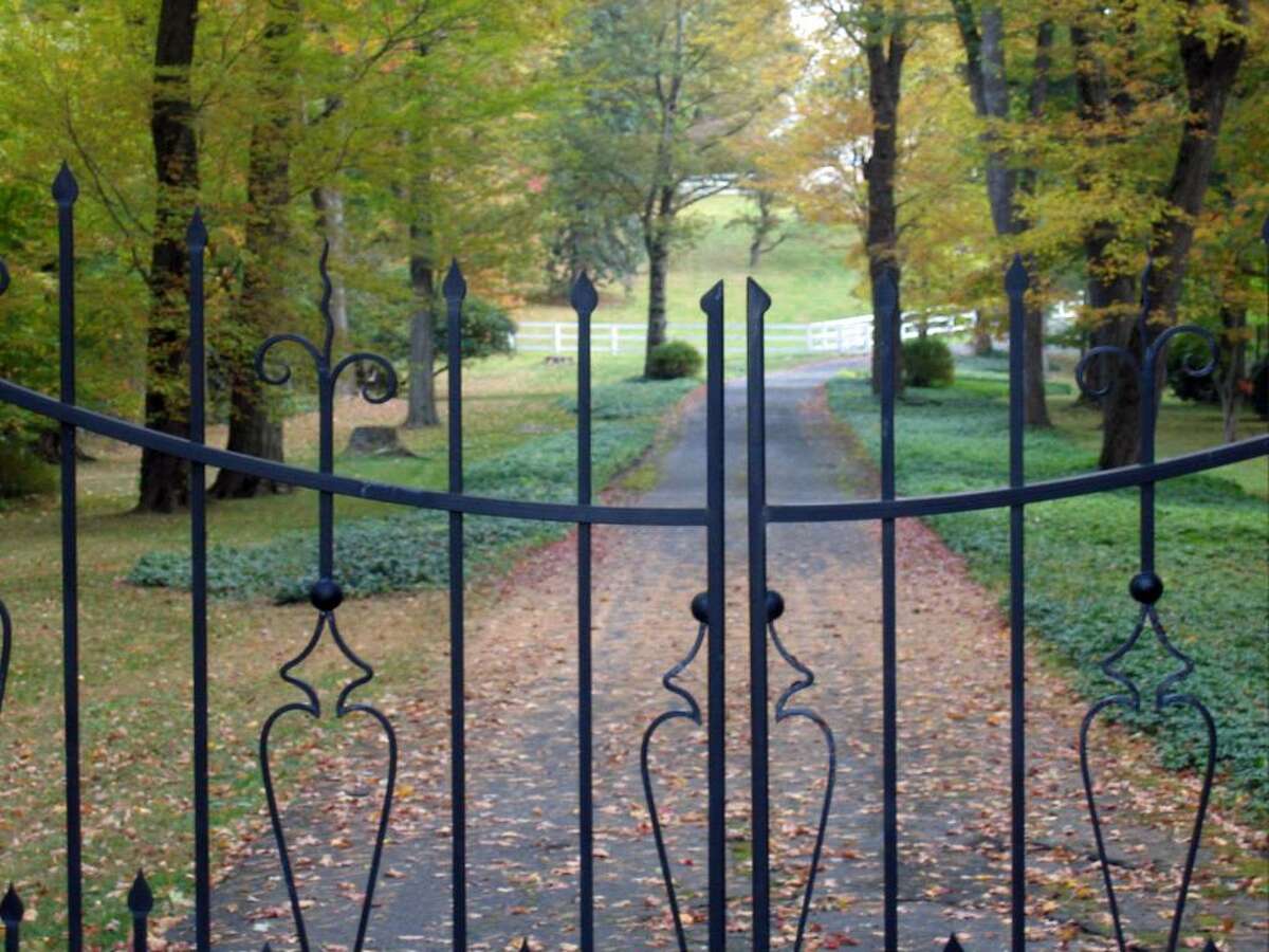 Billionaire Raj Rajaratnam's gated estate on Round Hill Road, Wednesday, Oct. 21, 2009. Rajaratnam is a hedge fund boss and accused mastermind of a $25 million insider trading scam.