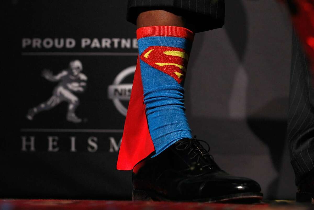 NEW YORK, NY - DECEMBER 10: A detail view of Heisman Memorial Trophy Award winner Robert Griffin III of the Baylor Bears showing his Superman socks during a press conference at The New York Marriott Marquis on December 10, 2011 in New York City. (Photo by Jeff Zelevansky/Getty Images)