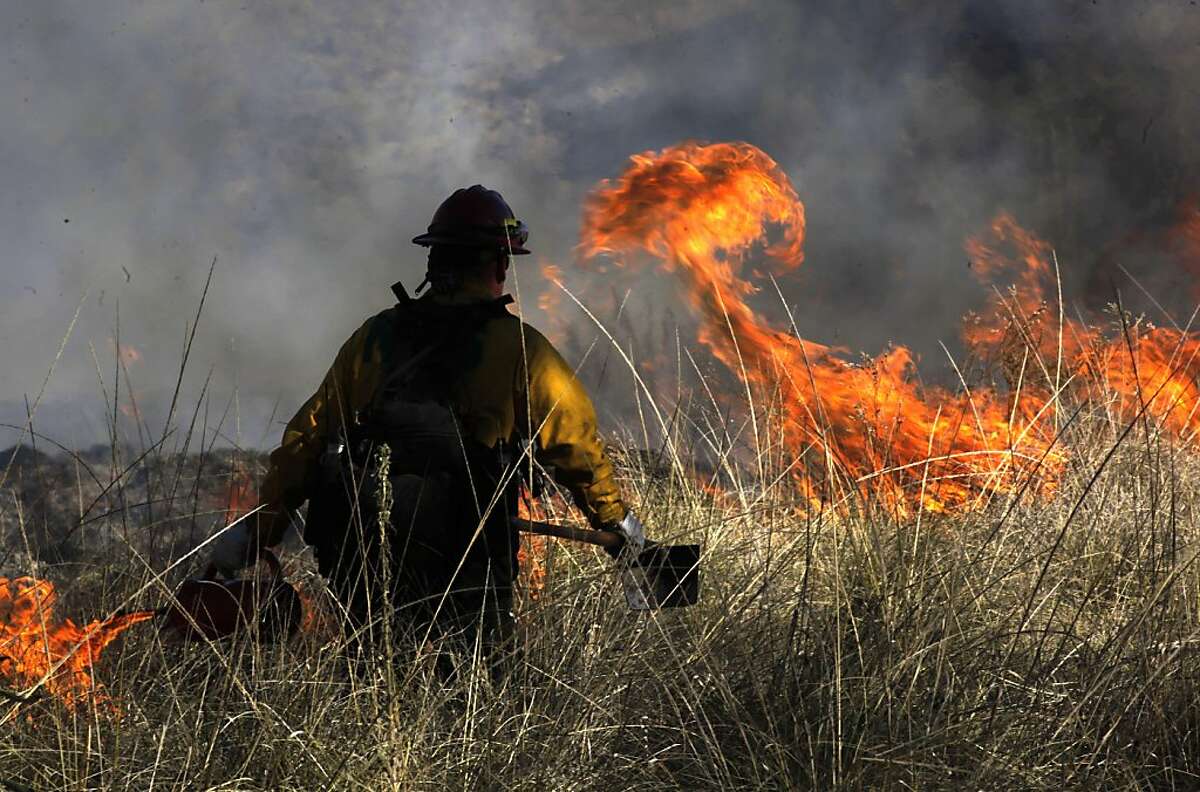 Grass is burned to study Indian culture