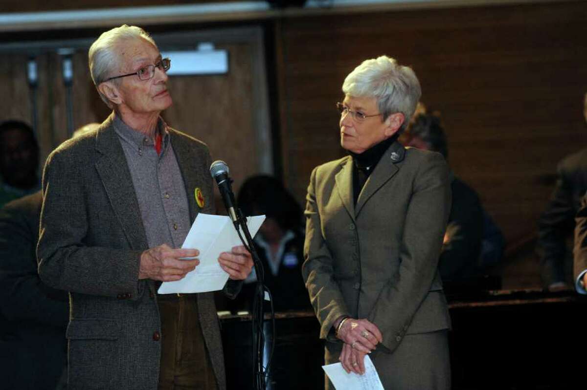 Malcolm Dexter, of Greenwich, spoke in support of the Sustinet health care reform plan at Gov. Dan Malloy's town hall-style meeting at Eastern Middle School in Riverside, on Monday, March 28, 2011. Lt. Gov. Nancy Wyman listens at right.