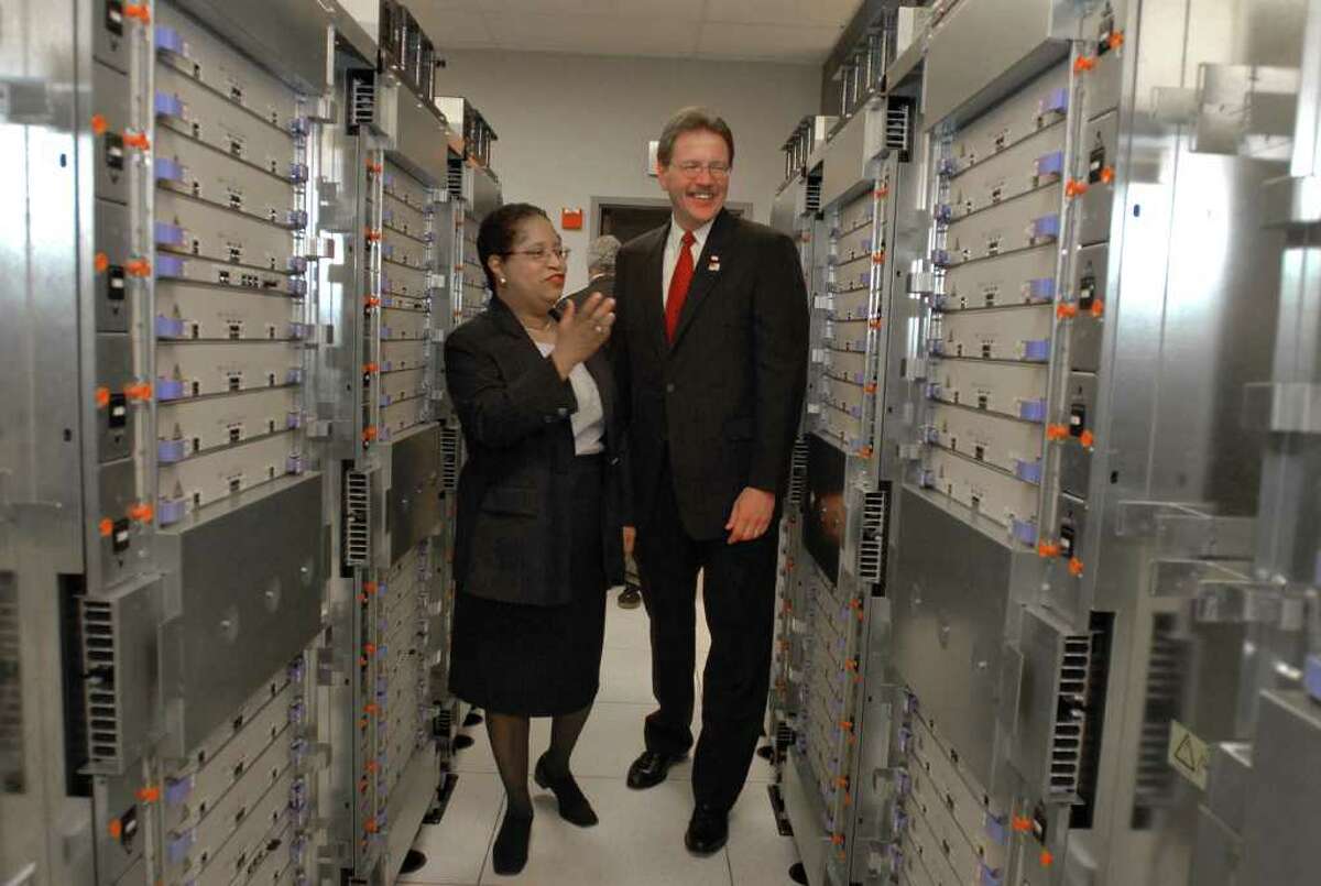 RPI President Shirley Ann Jackson walks with IBM's John Kelly lll through the supercomputing center at the Rensselaer Technology Park in North Greenbush. Grant money sought to help fund a $125 million supercomputer was not awarded. Times Union staff photo by Lori Van Buren Lori Van Buren/TIMES UNION