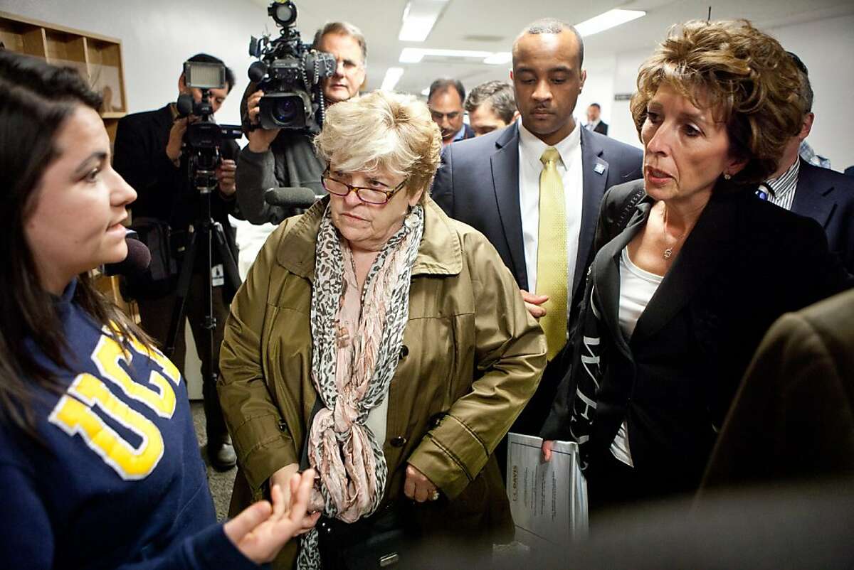 University of California, Davis student Jerika Heinze, left confronts chancellor Linda Katehi, right, outside a Joint Informational Hearing on the UC Davis pepper spray incident at the State Capitol in Sacramento, CA, December 14, 2011.
