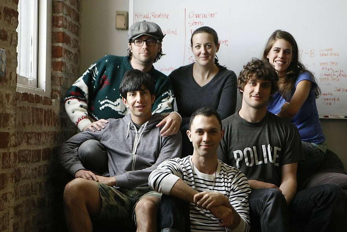 Director Ben Randle (center, seated) and his actors - Mike Delaney, Roy Landaverde, Rosie Hallett, Danielle Perata, and Josh Schell - during rehearsal for the upcoming One Minute Play Festival in San Francisco, Calif., on Sunday, Dec. 11, 2011.