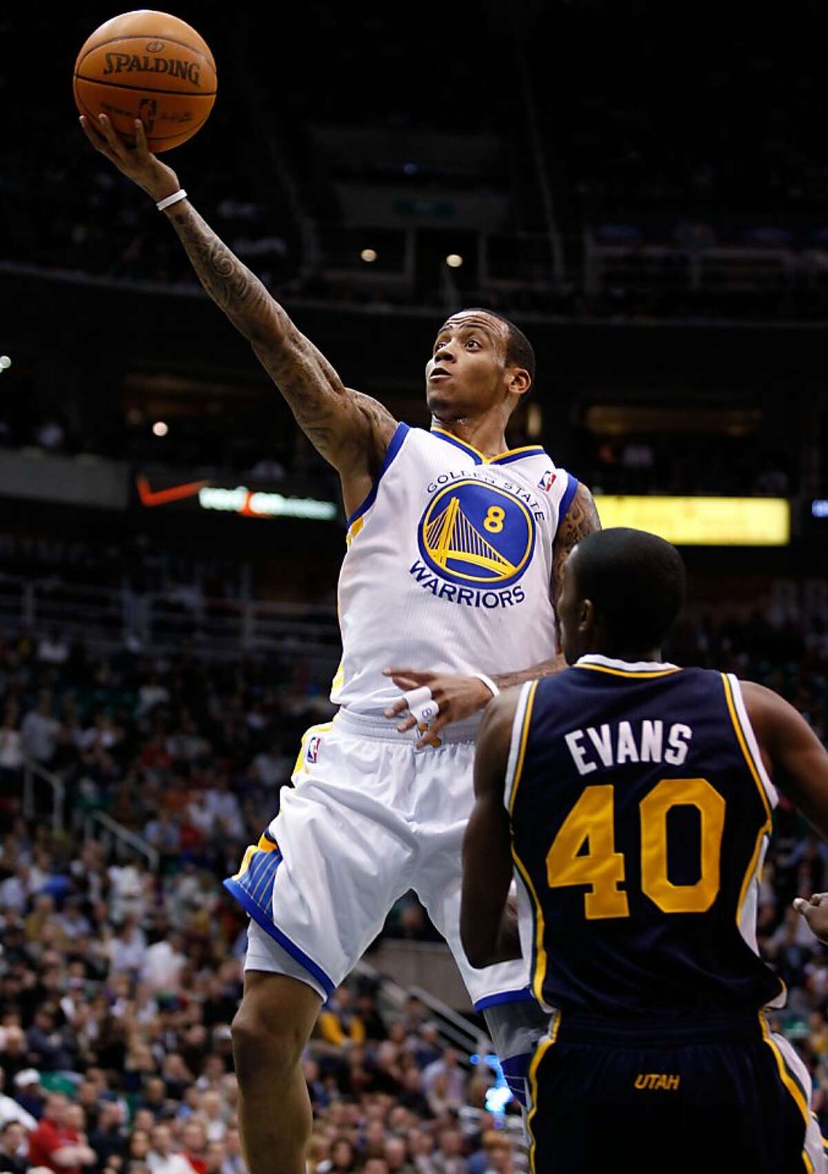 Golden State Warriors guard Monta Ellis (8) goes up for a shot against Utah Jazz forward Jeremy Evans (40) during the first half of an NBA basketball game in Salt Lake City, Wednesday, Feb. 16, 2011. (AP Photo/Steve C. Wilson) Ran on: 02-17-2011 Monta Ellis went 16-for-25 from the floor as he scored 35 points. Ellis also collected seven assists. Ran on: 02-17-2011 Monta Ellis went 16-for-25 from the floor as he scored 35 points. Ellis also collected seven assists.