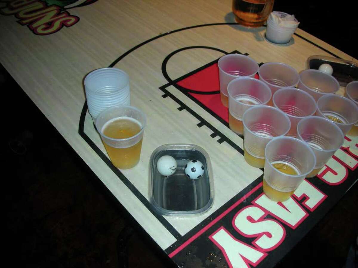 Beer Pong, showed above, is one of the top drinking games for teens and young adults. Photo courtesy of tympsy via Flickr