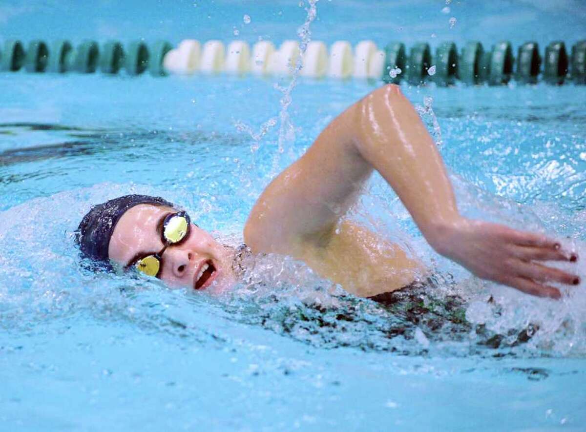 Nicole Rogers of Convent of the Sacred Heart swims the freestyle leg in the 200 IM event during swim meet between Convent of the Sacred Heart and Ethel Walker School at Convent of the Sacred Heart in Greenwich, Wednesday afternoon, Jan. 11, 2012.