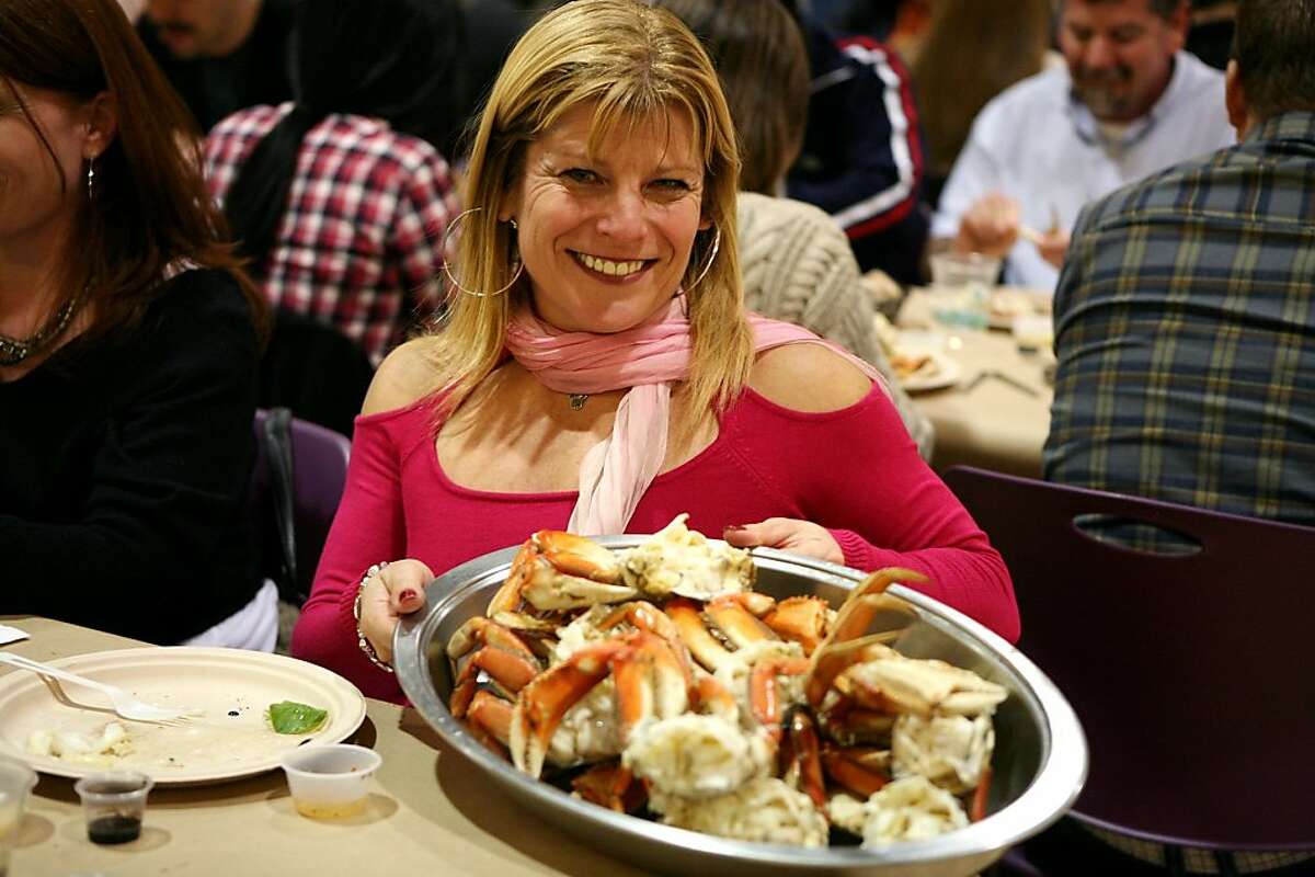 Debby Levy enjoying crab at the Slow Food Crab Dinner held at the Women's Building in the Mission on December 3, 2011.