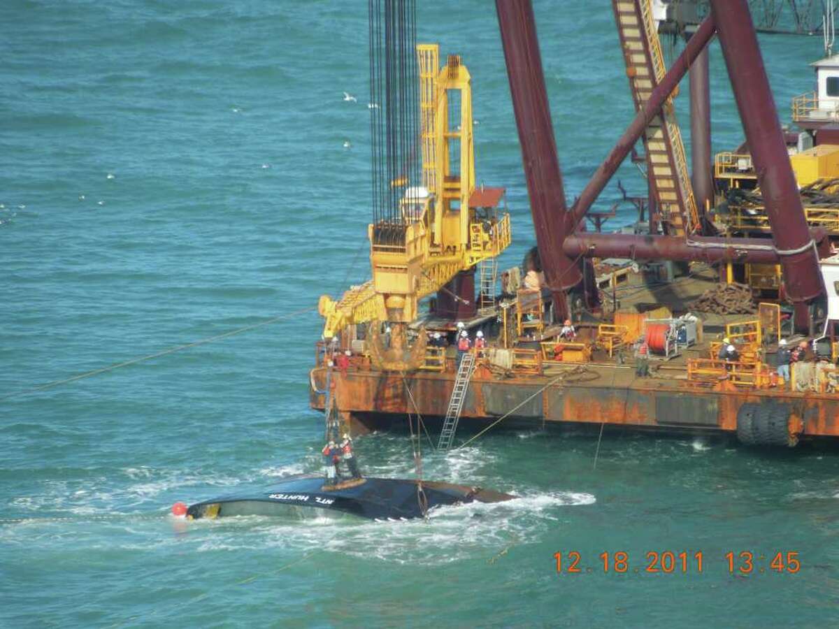 The Int'l Hunter capsized near Port Arthur on Dec. 13. International Marine, LLC and the United States Coast Guard are working to survey and salvage the vessel.