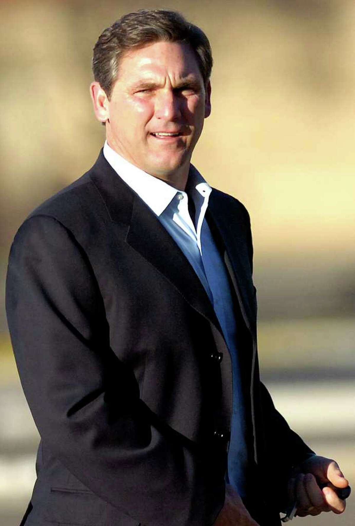 FILE - In this March 13, 2011, file photo, college football analyst Craig James is seen in Lubbock, Texas. James, who starred as a tailback at Southern Methodist University and with the New England Patriots in the 1980s, announced Monday, Dec. 19, 2011 he was running for the U.S. Senate as a Republican from Texas, a GOP fundraiser said. James would be running for the 2012 Senate seat being vacated by retiring Republican Kay Bailey Hutchison. (AP Photo/Geoffrey McAllister, File)